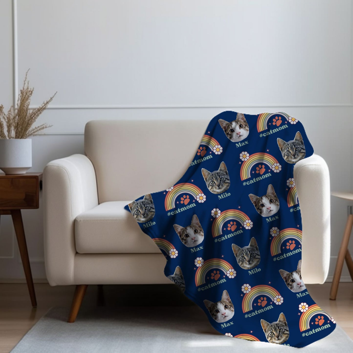 personalized cat photo and name blanket for cat moms in navy on a chair