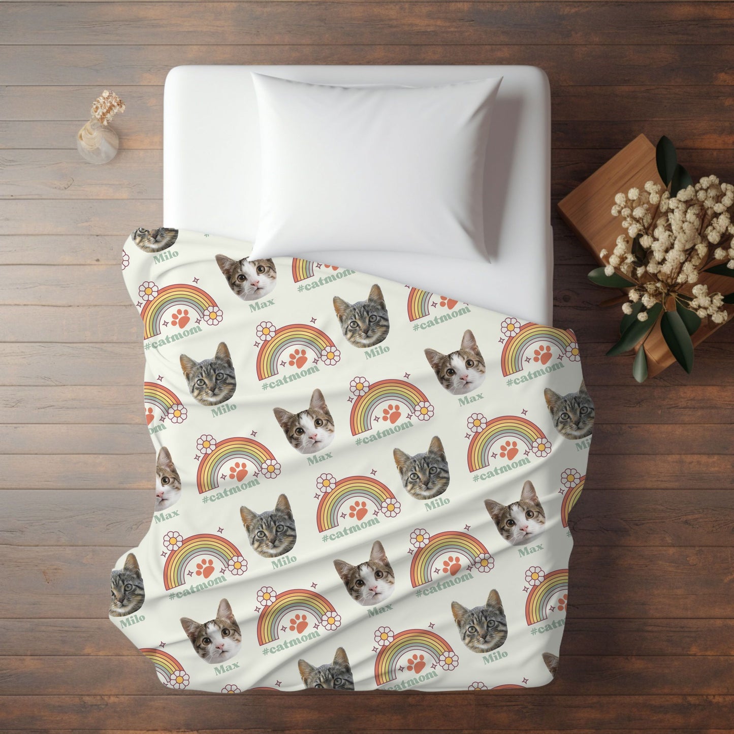 personalized cat face photo blanket for cat moms in ivory on a bed