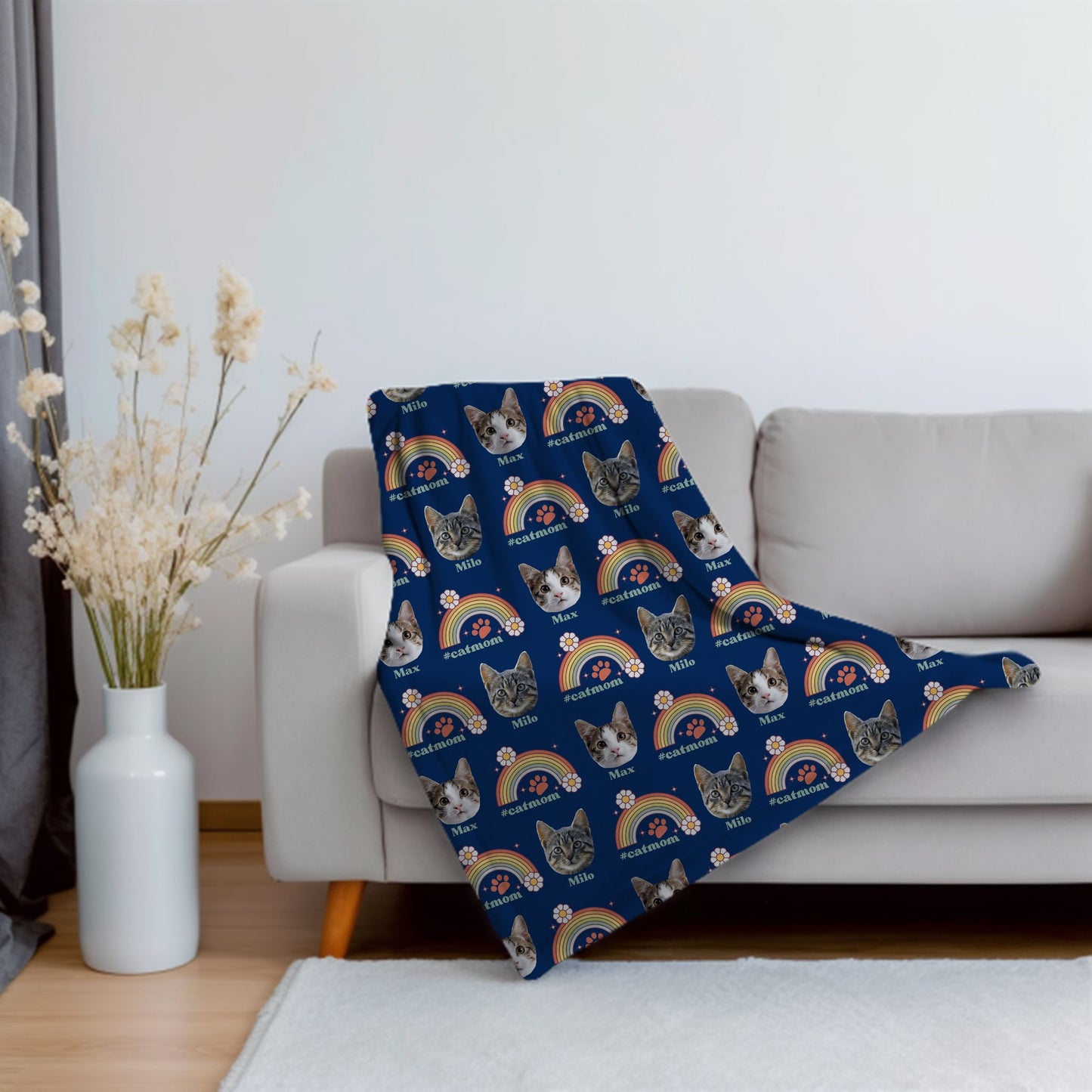 custom cat mom retro rainbow blanket in navy on a sofa