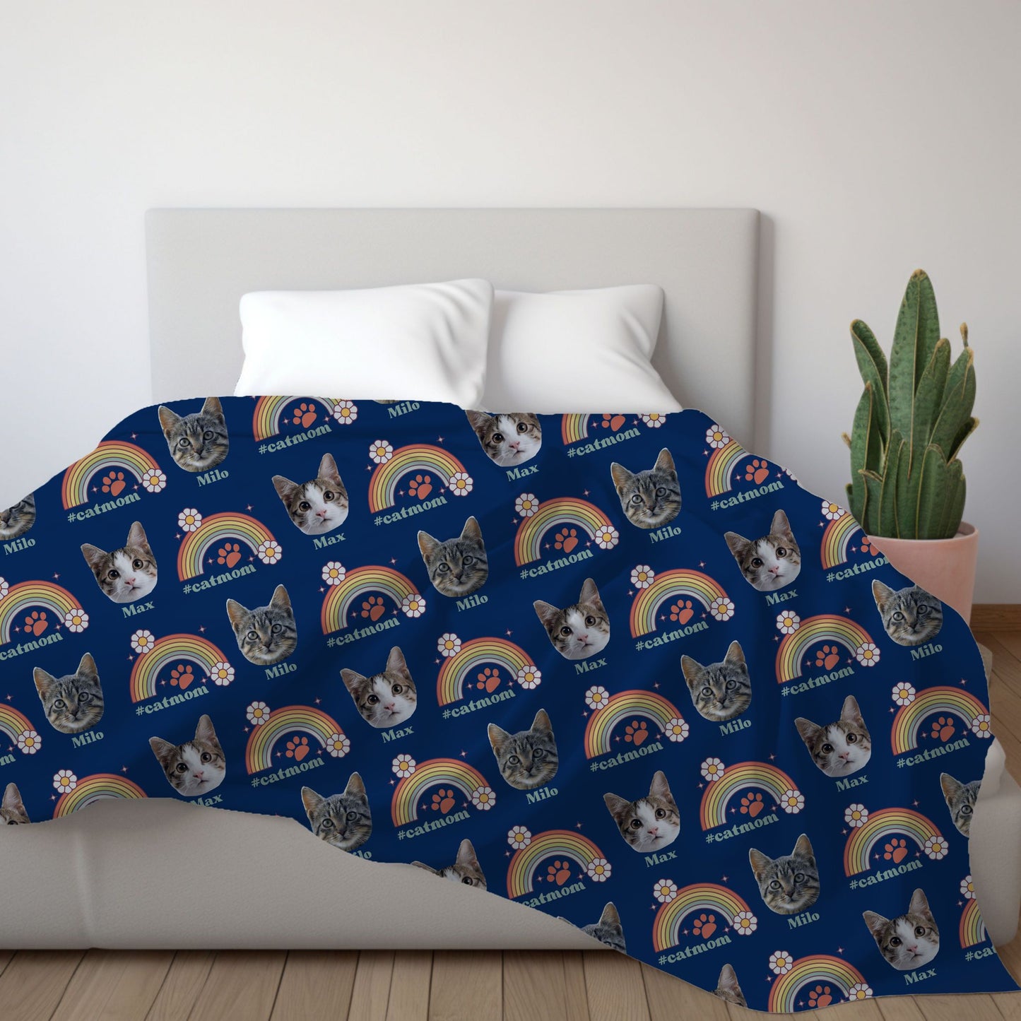 personalized cat photo and name cat mom blanket in navy on a bed