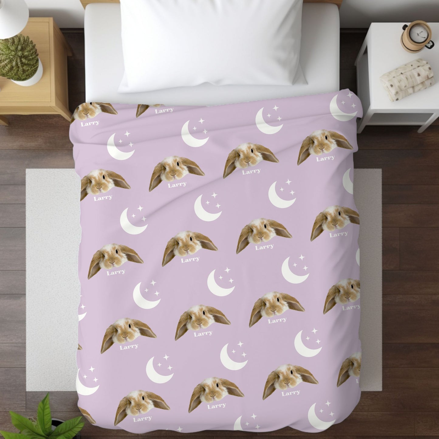 cosmic personalized pet photo blanket in lilac on a bed with a rabbit on it