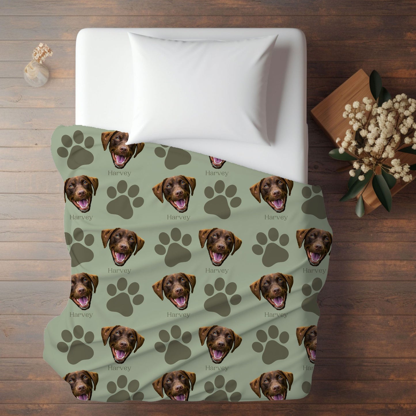 personalized dog photo blanket in sage/olive on a bed