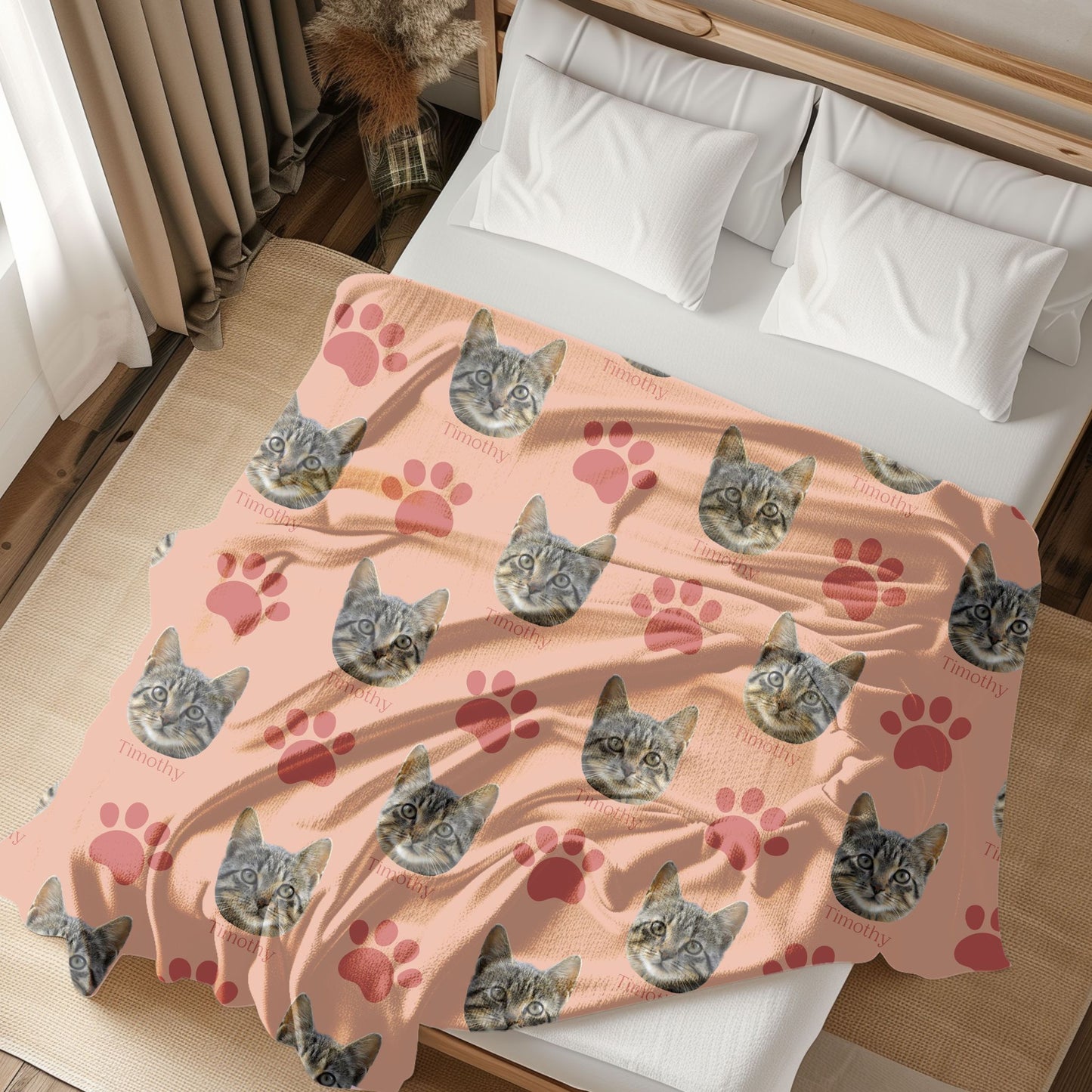 custom paw print cat picture blanket in peachy/blush on a bed