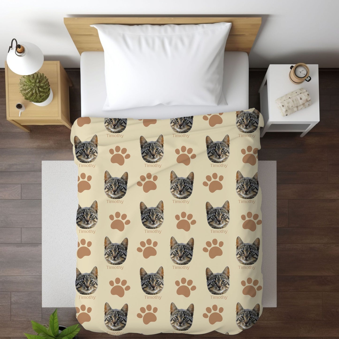 custom cat portrait blanket in sand/camel on a bed