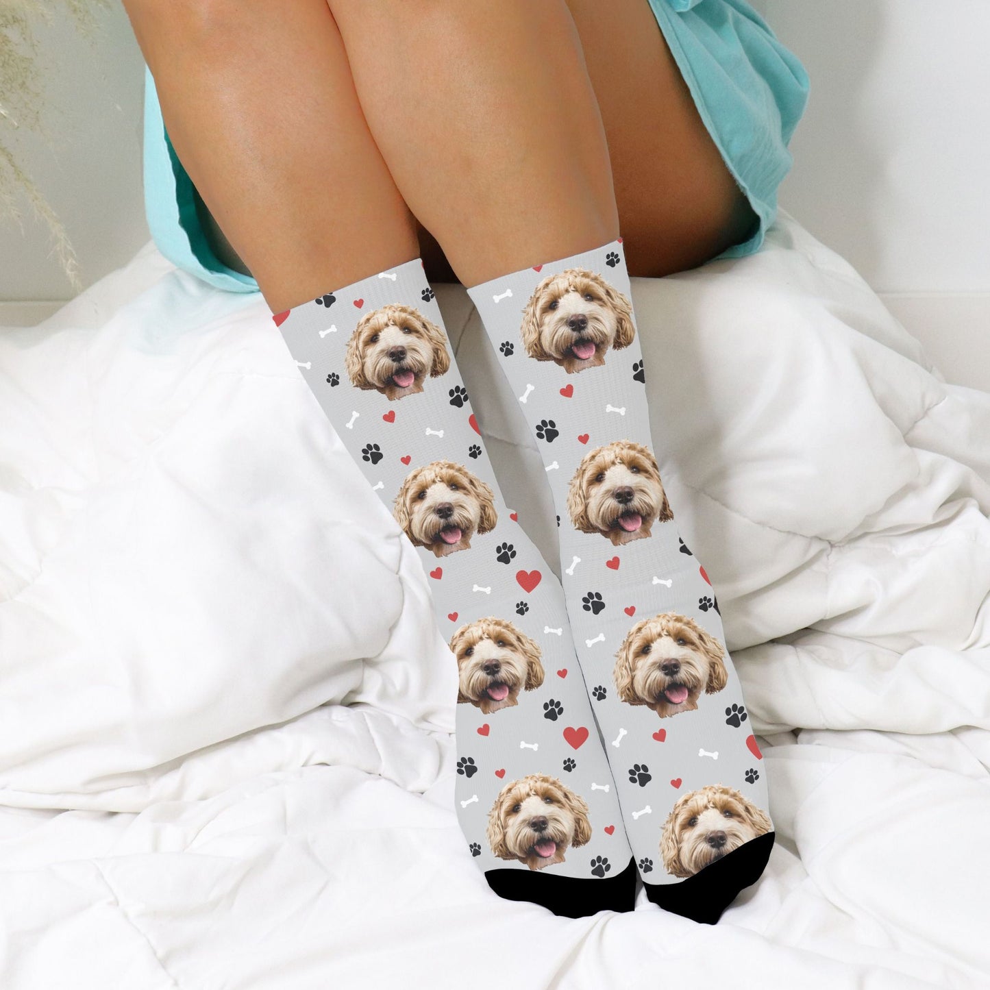 personalized dog picture socks in gray with a dog on them worn by a woman