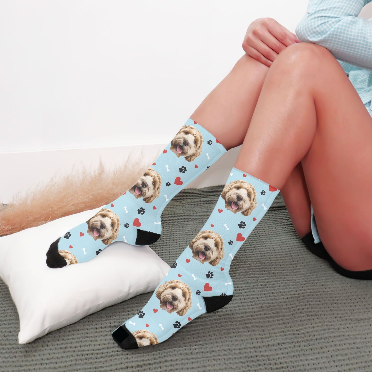 personalized dog face photo socks in blue with a dog on them worn by a woman
